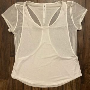 white lululemon top with mesh sides